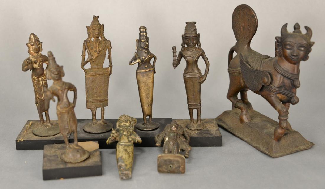 Group of eight early bronze figures,  three standing (1 of 6)