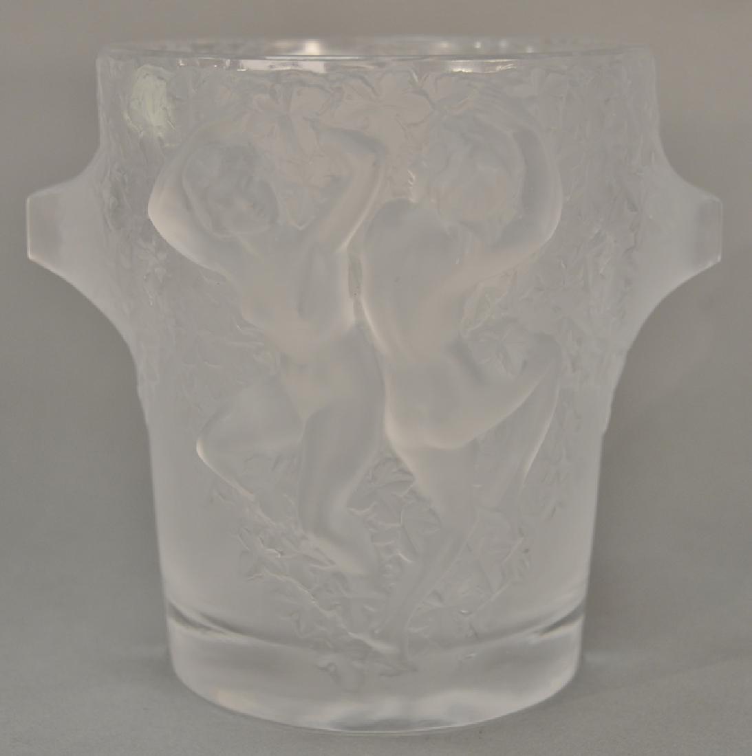 Lalique frosted glass Ganymede wine cooler, having: Lalique frosted glass Ganymede wine cooler, having molded figures on each side of champagne bucket, signed on bottom: Lalique France. height 9 inches, rim diameter 7 3/4 inches *No credit card payment