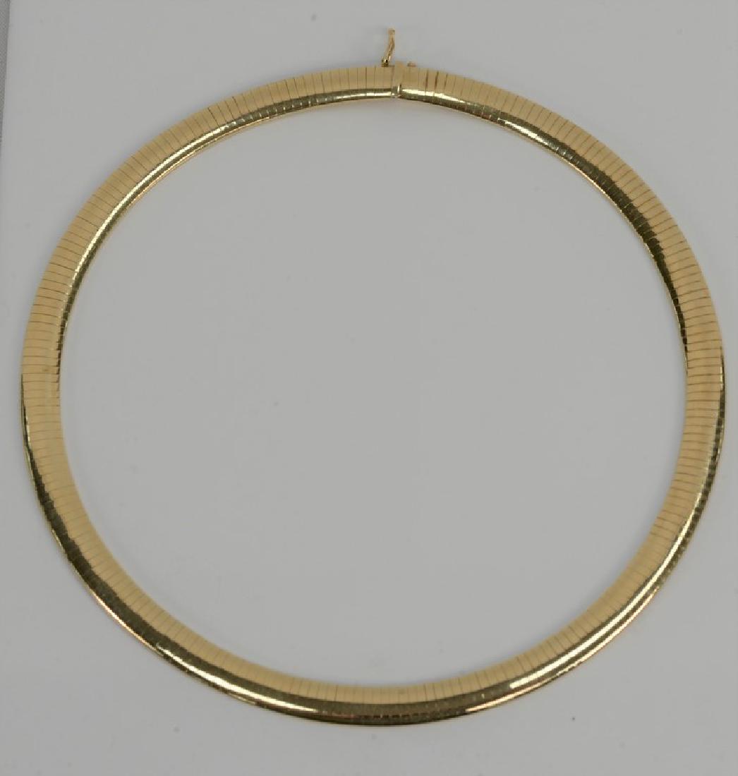 14 karat gold choker having bowed top surface. 52.4: 14 karat gold choker having bowed top surface. 52.4 grams *No credit card payments will be accepted for silver, gold, or jewelry from buyers that have not purchased from our gallery in the past.
