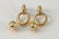 Two pairs of 14 karat gold ear clips to include a
