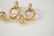 Two pairs of 14 karat gold ear clips to include a - 5