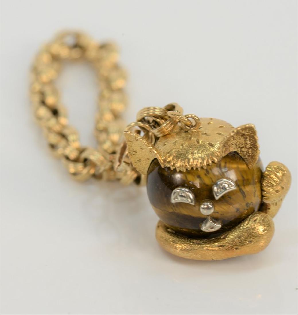 18 karat gold and tiger eye cat watch fob, having round (1 of 4)