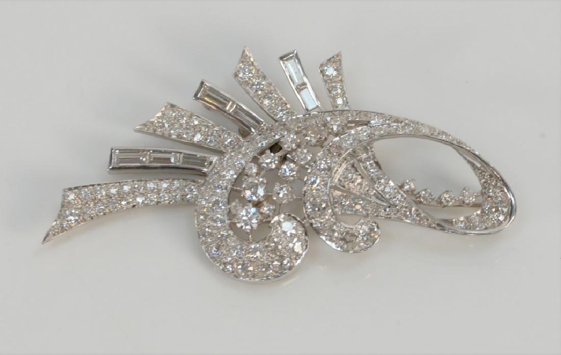 Platinum and diamond free form brooch set with round (1 of 3)
