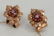 14 karat pink gold earrings, set with five rubies and