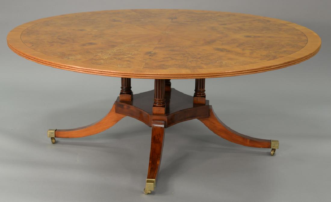 Round pedestal dining table with pads. ht. 29 in., dia. (1 of 5)