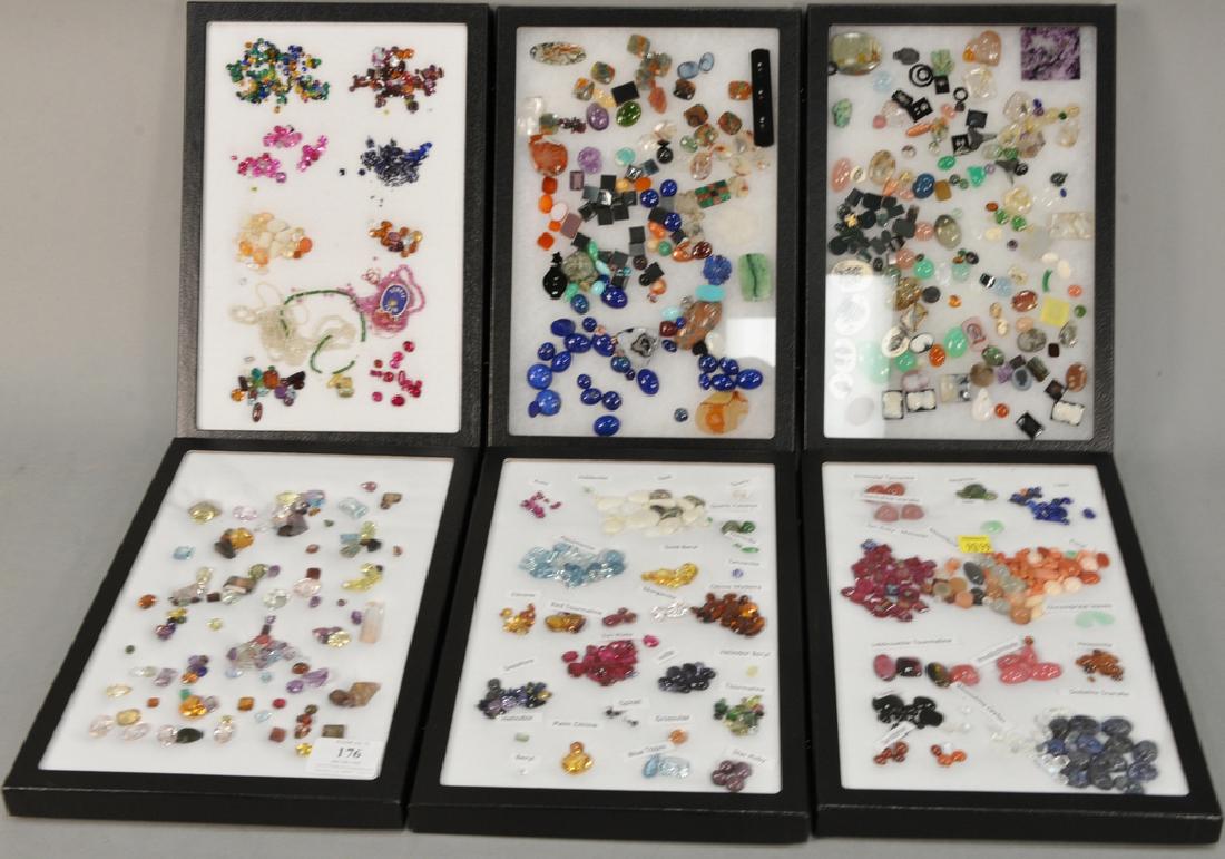 Six cases with loose gemstones including malachite, (1 of 9)