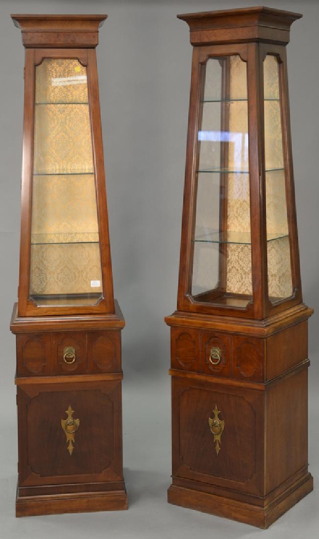 Pair of two part curio cabinets, signed Thomasville. ht