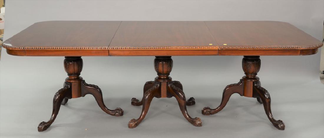 Mahogany triple triple pedestal dining table with ball: Mahogany triple triple pedestal dining table with ball and claw feet plus two extra 20 inch leaves. ht. 30 in., top closed: 48" x 96", top open: 48" x 136"*IMPORTANT NOTE: No credit card payments will