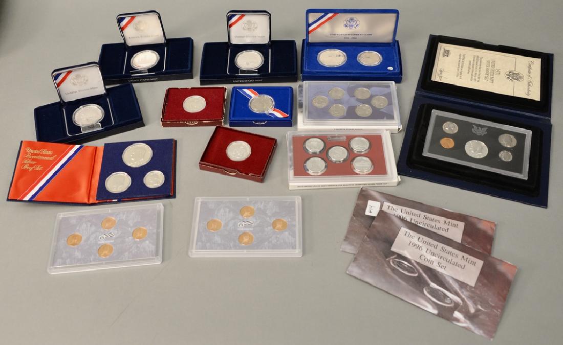 Coin lot to include two Special Olympics proof $1.00's;: Coin lot to include two Special Olympics proof $1.00's; Smithsonian proof $1.00; two 1982-S Geo. Wash proof 50 cents; Statue of Liberty proof 50 cent box; box 2010 proof silver 25 cent set; box 2009 C