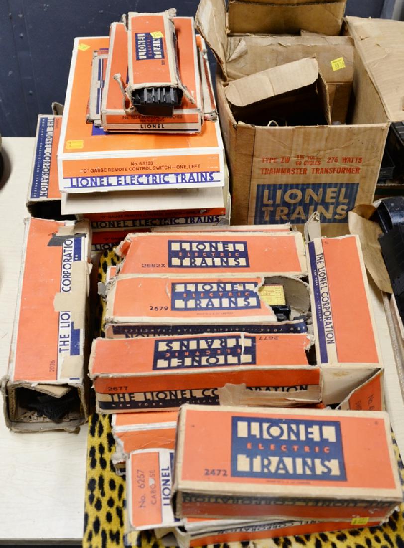 Full Lionel train set in original boxes to include two: Full Lionel train set in original boxes to include two engines, coal car, nine cares, train tracks, trainmaster transformer and multi control transformer.