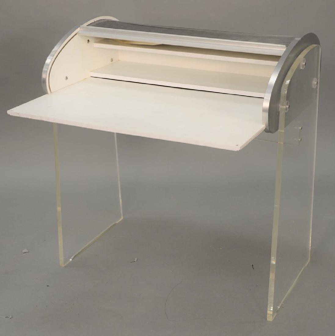Vladimir Kagan Lucite and metal laminate desk (tambour: Vladimir Kagan Lucite and metal laminate desk (tambour in need of minor repair). ht. 37 in., wd. 35 in.