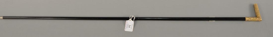 Presentation walking stick, ebony with gold top: Presentation walking stick, ebony with gold top Victorian cane, marked New Haven Dec 12, 1880.
