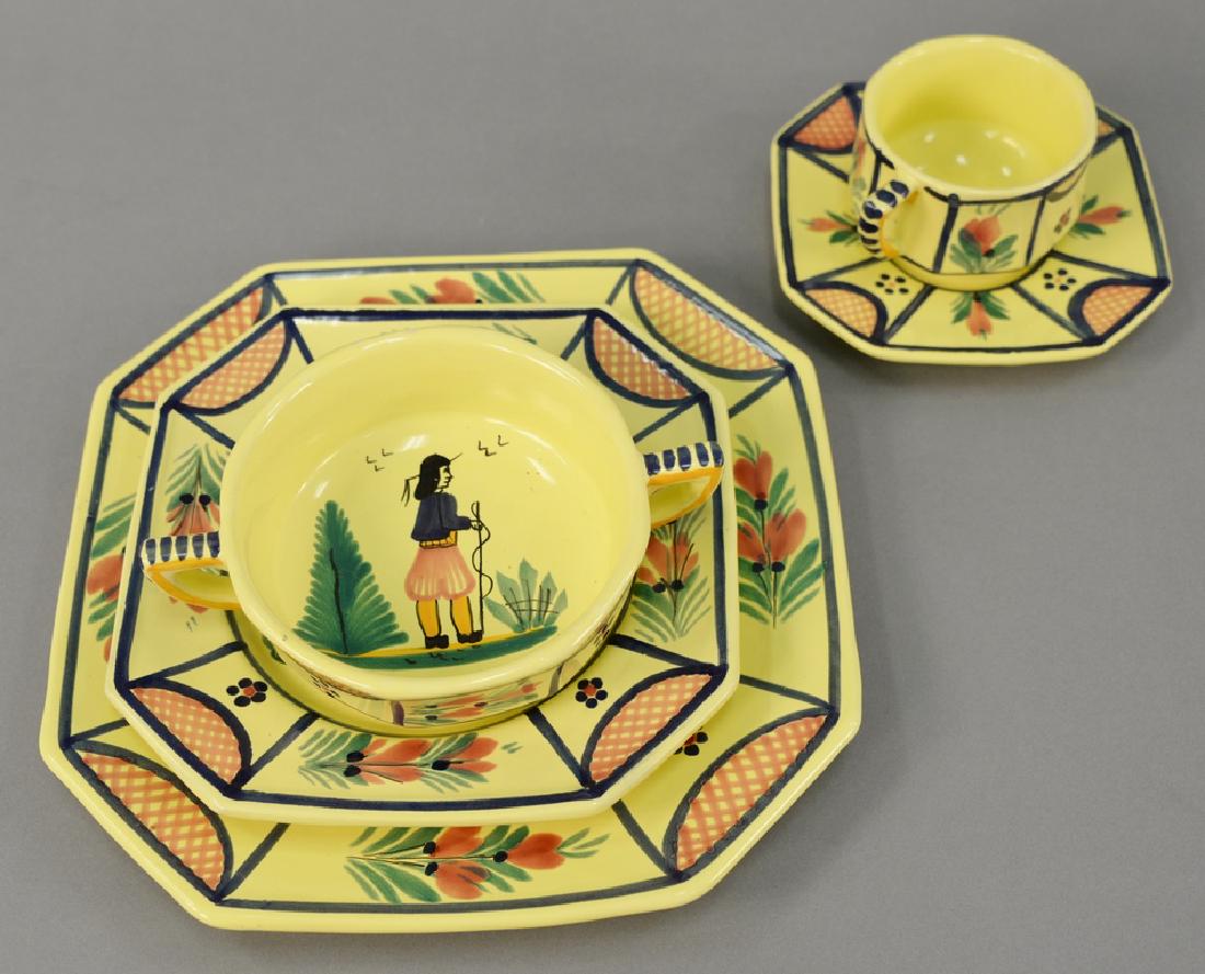 Quimper lot including twenty-four dinner plates,: Quimper lot including twenty-four dinner plates, twenty-eight lunch plates, twelve bowls, eighteen cups and saucers, eight egg cups, three platters, sugar, creamer, and teapot, 116 total pieces. Prove