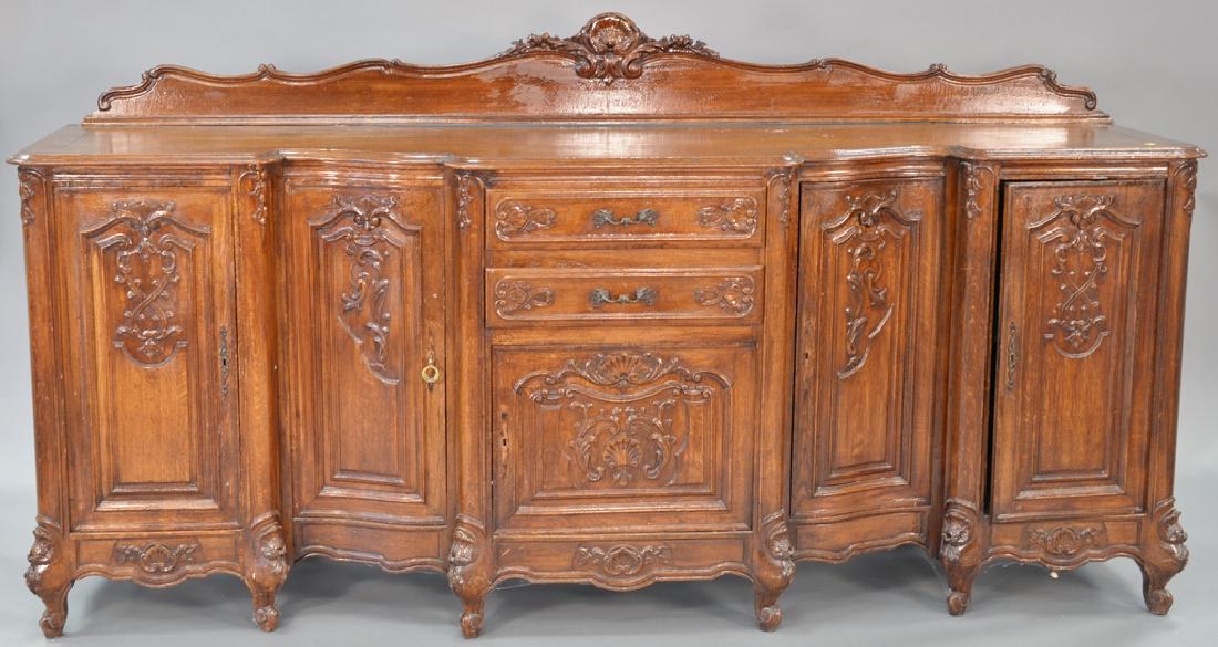 Louis XV style oak sideboard with doors and drawers.: Louis XV style oak sideboard with doors and drawers. ht. 40 in. with back, top: 24" x 98" Provenance: From an estate in Lloyd Harbor, Long Island, New York