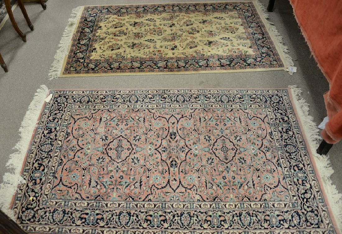 Two Oriental throw rugs. 3' x 5' each. Provenance:: Two Oriental throw rugs. 3' x 5' each. Provenance: Estate of Stephen M. Serlin of Lake George, New York