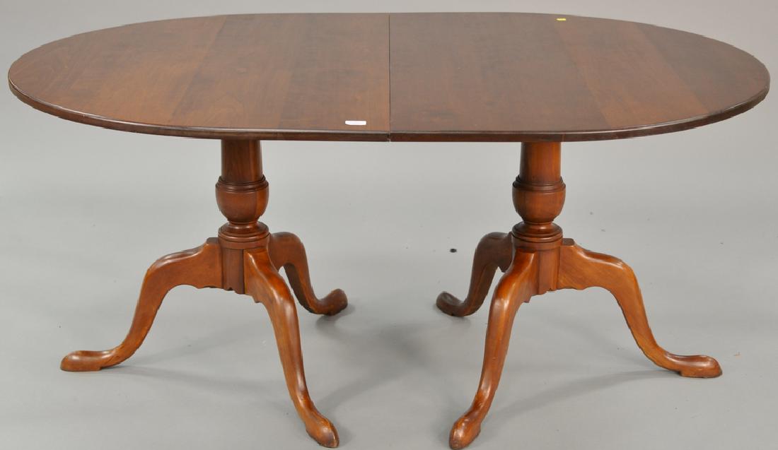 Eldred Wheeler cherry oval double pedestal table (no: Eldred Wheeler cherry oval double pedestal table (no leaves). ht. 30 in., top: 42" x 64"