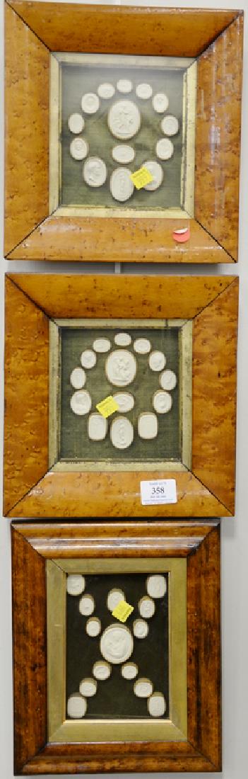 Collection of forty-two framed white plaster Grand Tour: Collection of forty-two framed white plaster Grand Tour Intaglios in three separate burl maple frames, similar to wax seals. 10 1/4" x 9 3/4" & 10 3/4" x 9" framed Provenance: From an estate in Lloyd