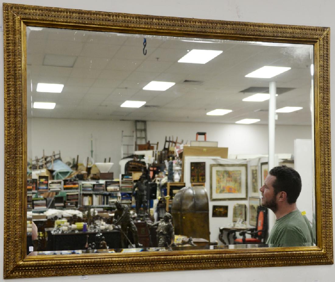 Three piece group to include two large gold framed: Three piece group to include two large gold framed mirrors (48" x 36" & 58 1/2" x 44") and a large three dimensional plaster plaque having men on horses (as is) 39" x 48".