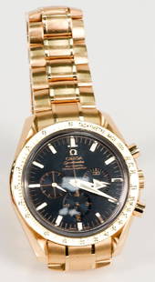 Omega 18 karat rose gold watch Speedmaster: Omega 18 karat rose gold watch Speedmaster Automatic Chronometer, dial 39mm, back marked: Broad Arrow, like new condition. 222.9 grams total weight