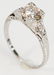 Platinum and diamond engagement ring having center
