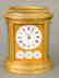 Oval Tiffany & Co. carriage clock, white enameled dial
