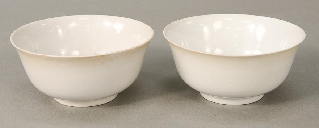 Pair white (Blanc de Chine) bowls, China, 18th/19th: Pair white (Blanc de Chine) bowls, China, 18th/19th century, classic shape with sloping sides rising to everted rims and raised on short cylindrical feet (minor rim flecks to one). ht. 2 1/2 in., dia.