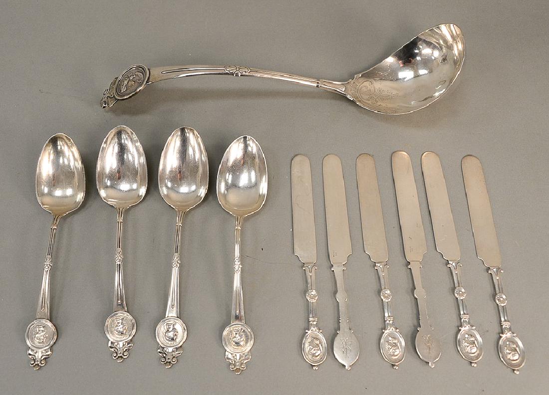 Eleven piece Medallion set with large ladle, (1 of 6)