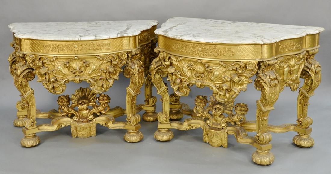 Pair of gilt Louis XIV style console tables with shaped (1 of 20)