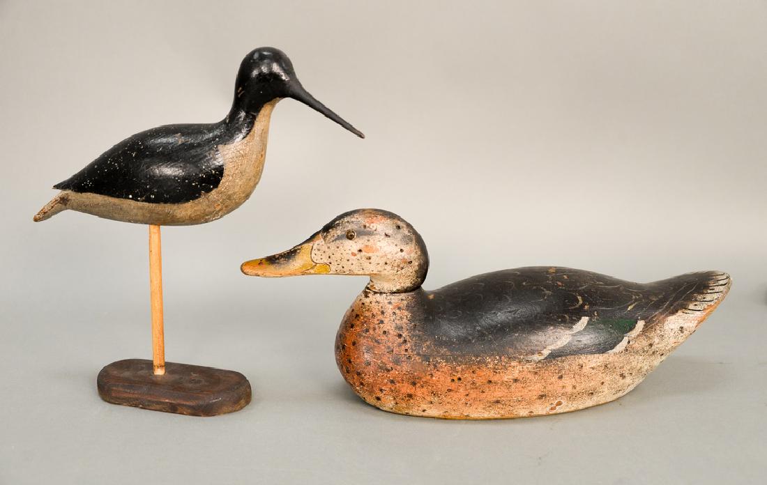 Two decoys including one duck decoy with glass eyes and (1 of 8)