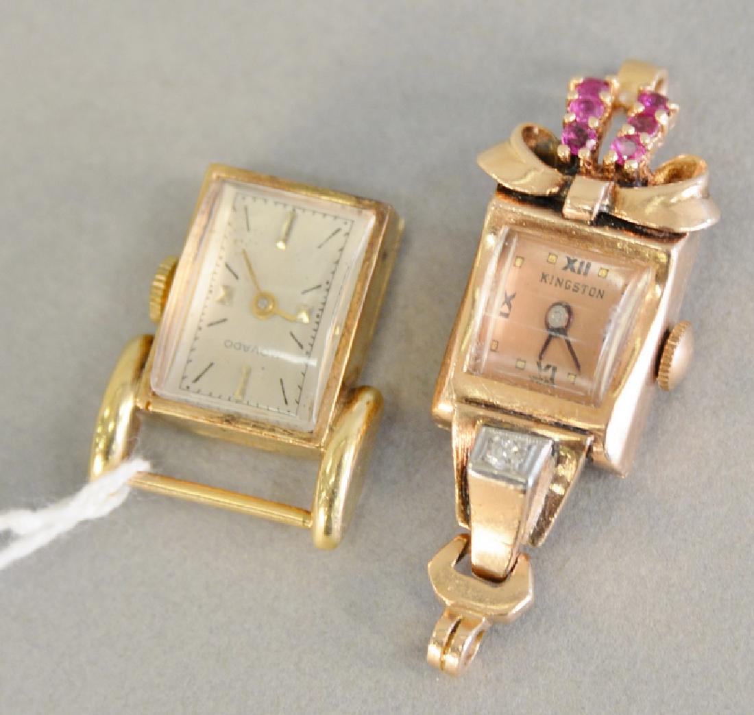 Two 14 karat gold ladies watch, no bands, one Movado.: Two 14 karat gold ladies watch, no bands, one Movado. 21.6 grams total weight