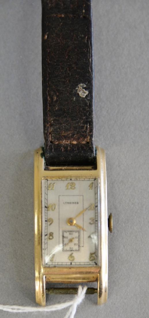 14 karat gold Longines curvex vintage mens wristwatch.: 14 karat gold Longines curvex vintage mens wristwatch. 19.6x31.6mm