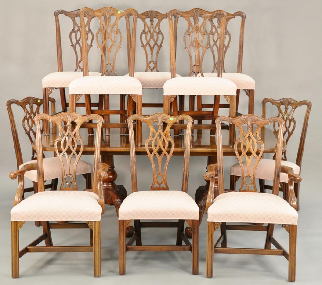 Henredon eleven piece dining set to include ten: Henredon eleven piece dining set to include ten Chippendale style chairs and a double pedestal table with ball and claw feet, two 24 inch leaves, and custom pads. ht. 29 in., top: 45" x 72", opens to