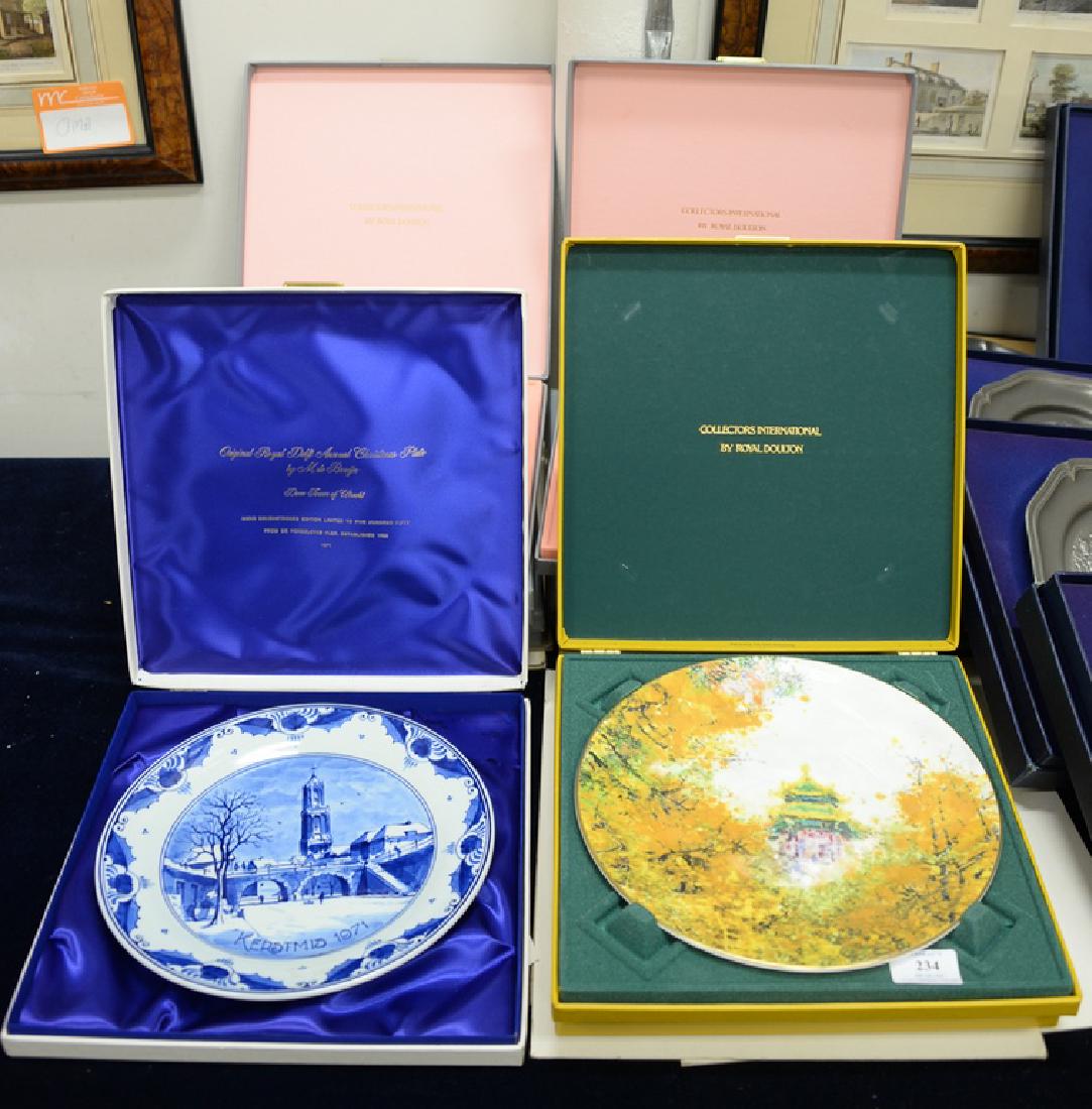 Group of nine collectors plates to include two chen chi: Group of nine collectors plates to include two chen chi Imperial palace, six chen chi Royal Doulton garden of tranquility, Royal Delft Christmas plate, dia. 10 in. to 10 1/2 in. Provenance: An Estate