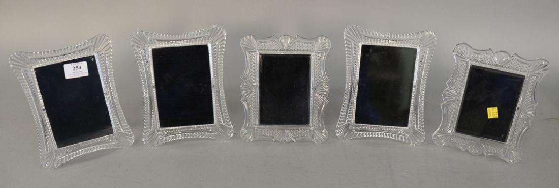 Group of 5 Waterford crystal picture frames in two: Group of 5 Waterford crystal picture frames in two styles. 7 3/4" x 6 1/2" to 8 1/2" x 6 1/2"