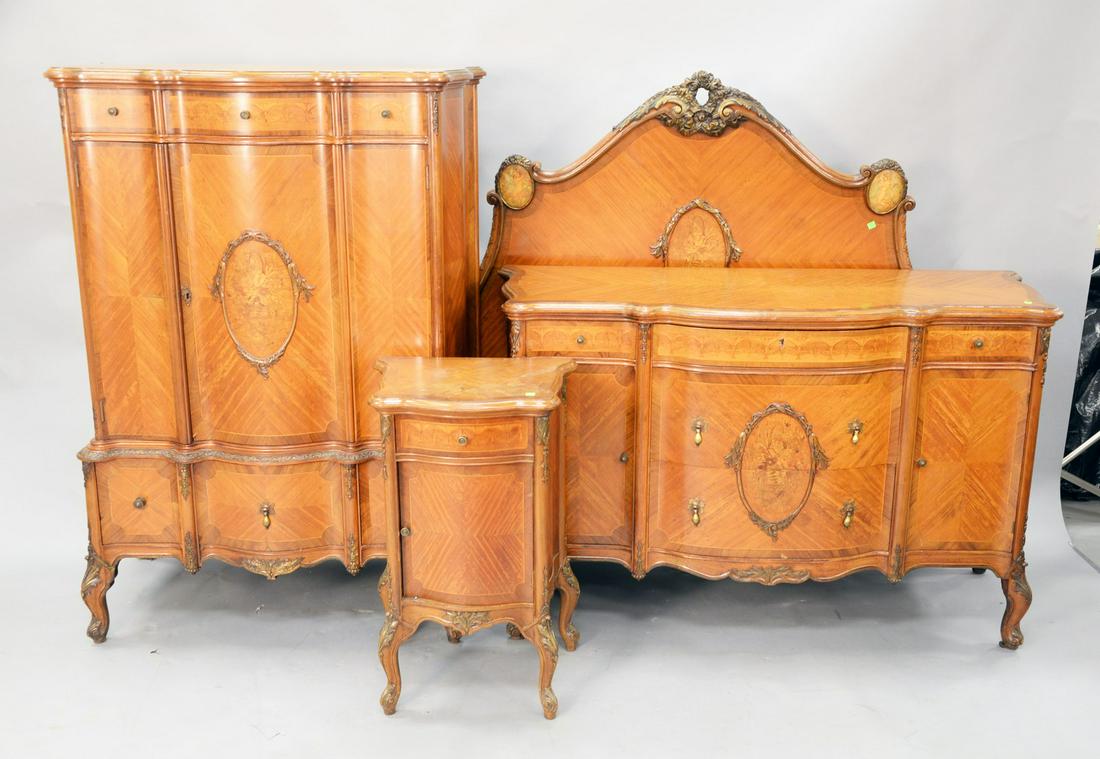 Five piece Louis XV style inlaid bedroom set to include: Five piece Louis XV style inlaid bedroom set to include tall chest, vanity, chest, night table and double bed, (water damage on top of night table). vanity ht. 31 in., top: 24" x 52".