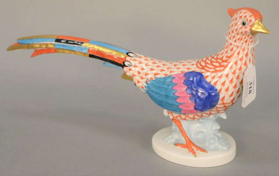 Herend porcelain pheasant in orange fishnet. Ht. 6 1/4: Herend porcelain pheasant in orange fishnet. Ht. 6 1/4 in., Lg. 13in.