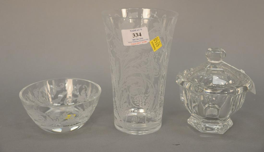 Three piece crystal group to include Baccarat covered: Three piece crystal group to include Baccarat covered crystal jar, Christofle orangerie crystal etched glass vase in original box, with matching bowl in original box. Tallest: 7 3/4 in.