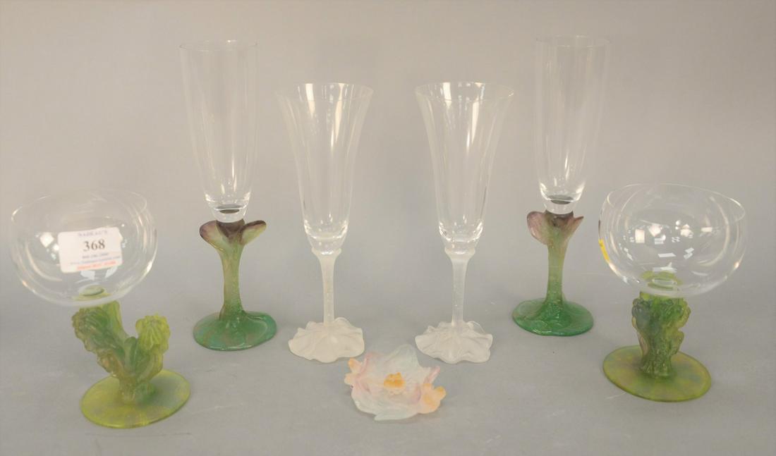 Daum France group to include three pairs of crystal: Daum France group to include three pairs of crystal stems (6 in., 8 1/4 in., 9 1/2 in.), champagne flutes with flower stem base, pair of white wine with green cactus frosted base, and an ornament.