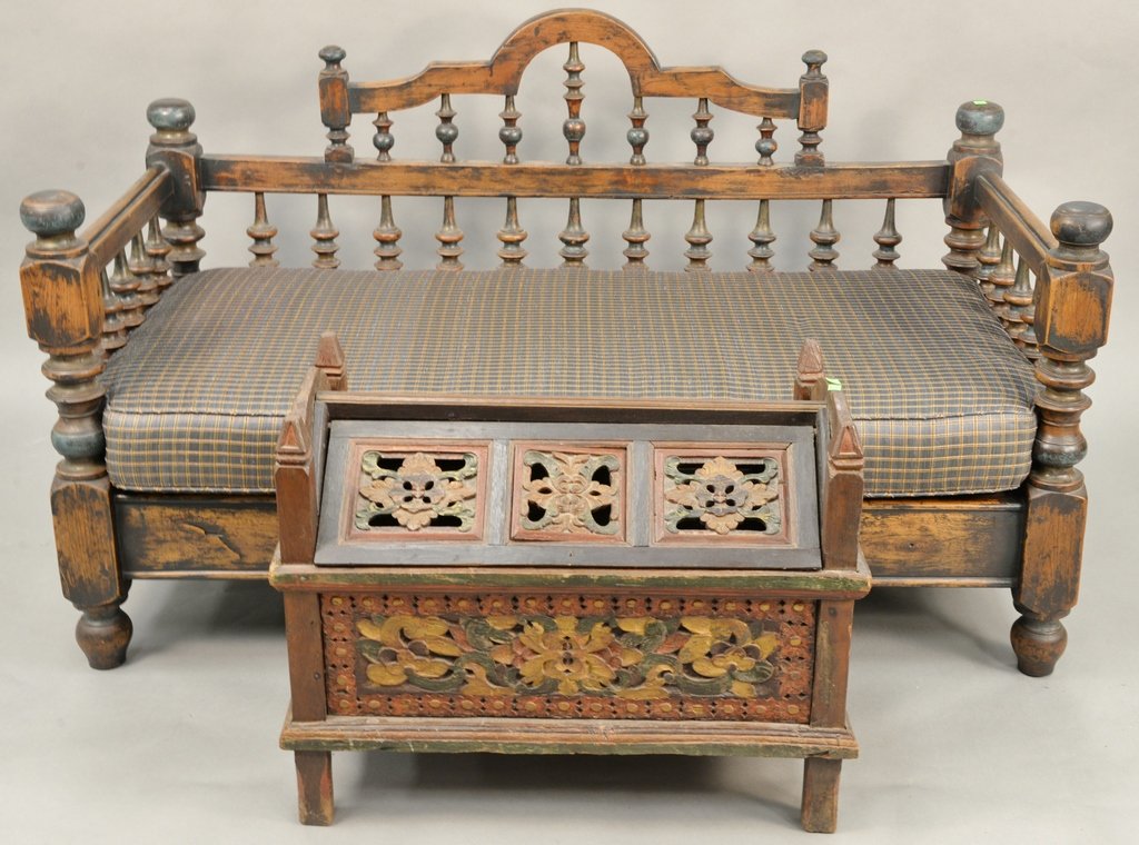 Two piece group to include a primitive spindle day bed: Two piece group to include a primitive spindle day bed and a carved painted chest. bed lg. 63 in.