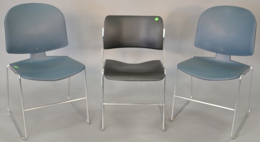 Lot of sixteen contemporary steel stacking chairs, four: Lot of sixteen contemporary steel stacking chairs, four by David Rowland.