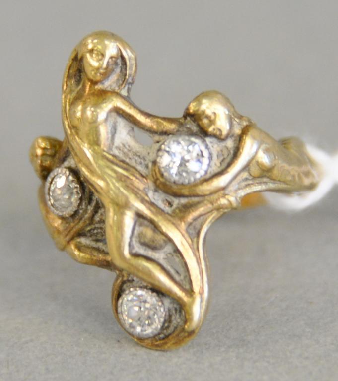18K gold Art Nouveau figural ring with woman flanked by: 18K gold Art Nouveau figural ring with woman flanked by young woman and boy, set with three old mine cut diamonds, size 2 1/4, total weight: 8 g.