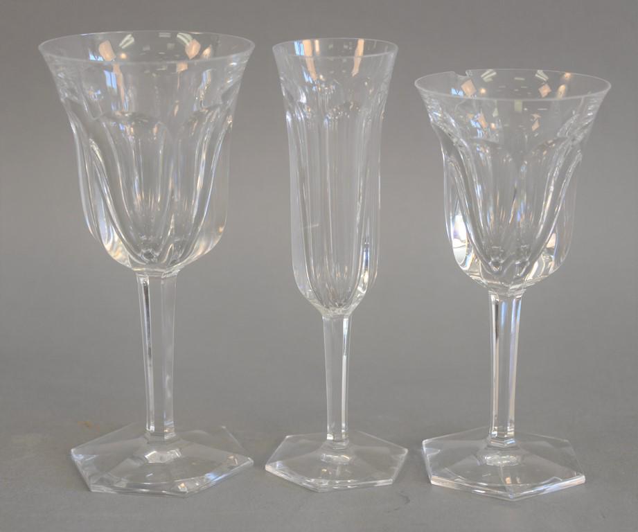 Three piece group of Baccarat stemware service to: Three piece group of Baccarat stemware service to include ten white wine glasses, twenty red wine glasses, and eleven champagne flutes, some chips and ground tops. ht. 7 in - 7 1/2 in. total count: 86