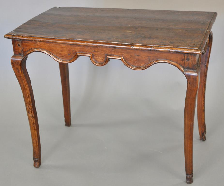 French Louis XV provincial walnut side table with: French Louis XV provincial walnut side table with rectangular top and hoot fee, 18th / 19th century. ht. 24 in., wd. 30 in., dp. 18 in.