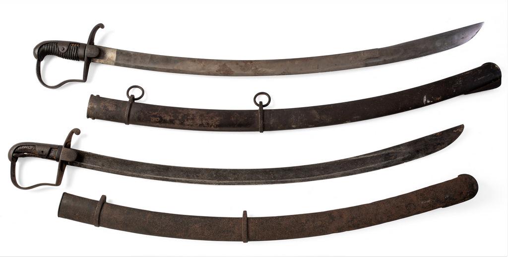 A PAIR OF BRITISH P1796 LIGHT CAVALRY SABERS WITH: A PAIR OF BRITISH P1796 LIGHT CAVALRY SABERS WITH SCABBARDS (2) 1)A Pattern 1796 saber for an enlisted trooper, iron-mounted hilt with reverse-P guard, the wooden grip with most of its leather wrap in