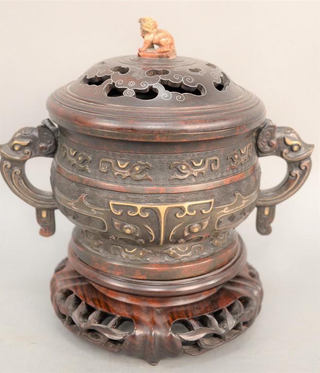 Fine bronze covered censer, China, probably Ming: Fine bronze covered censer, China, probably Ming Dynasty, in the form of a classic Shang Kuei or banquet tureen, decorated with central gold taotie mask, with stylized border of mythic beasts. Openwor