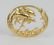 Julius Cohen 18 Karat Gold Pendant, with three jumping