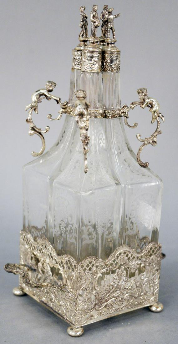 Figural Silver and Crystal Decanter Set, having four (1 of 3)