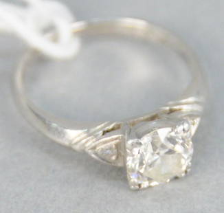 Platinum and diamond ring, with center diamond: Platinum and diamond ring, with center diamond approximately .60 carats.