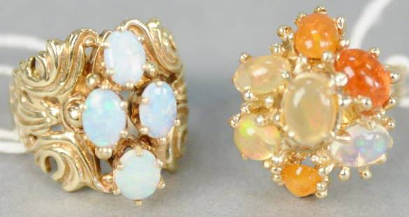 Two gold rings, with stones, one with four opals.: Two gold rings, with stones, one with four opals.