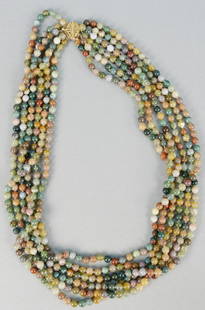 Beaded necklace, six strands with 14K gold clasp.: Beaded necklace, six strands with 14K gold clasp.